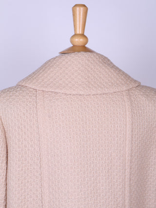 Cremefarvet frakke i uldsstof. 1960. L