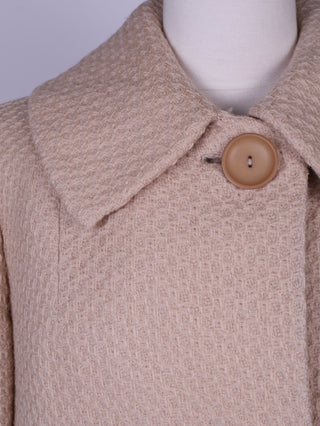 Cremefarvet frakke i uldsstof. 1960. L