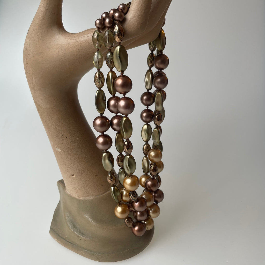 Halskæde. tre-radet. brune og gyldne store perler